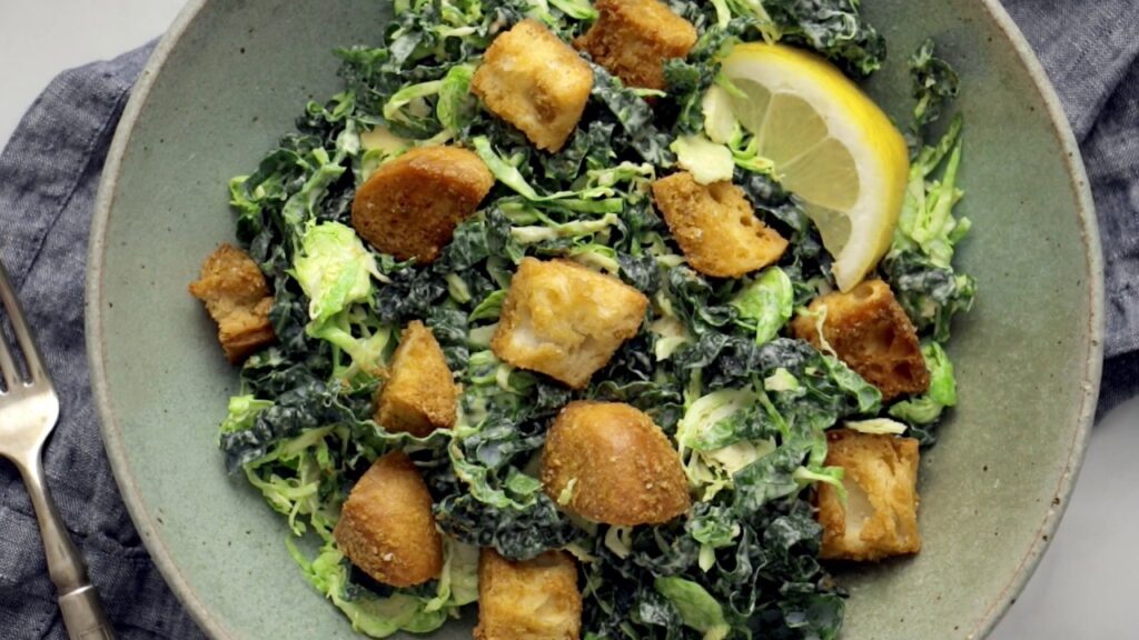 Brussels Kale Caesar with Cheezy Garlic Croutons