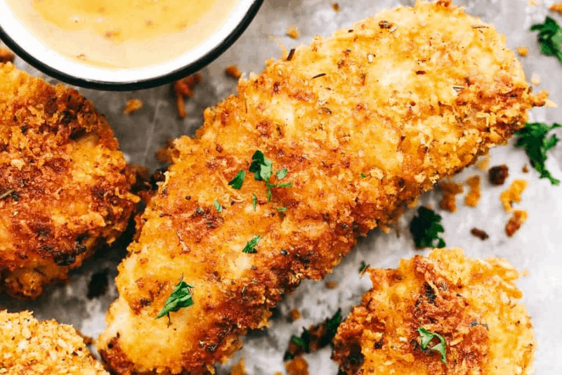 Crispy Parmesan Chicken Fingers with Garlic Cheese Sauce