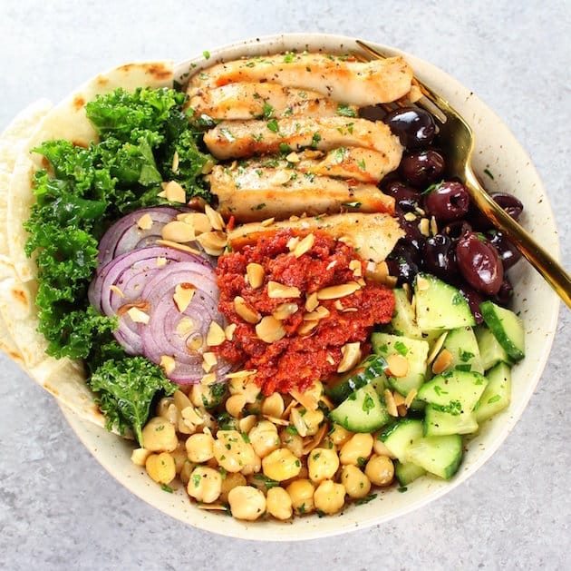 Flavor-Packed Marinated Kale and Chicken Bowls with Sun-Dried Tomato Sauce